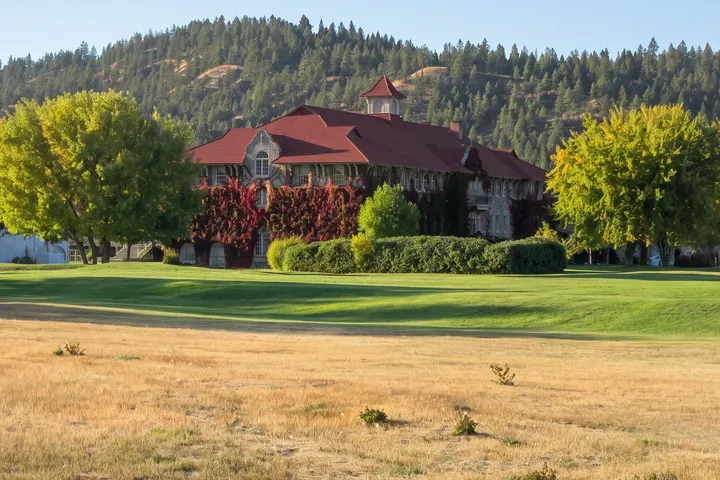 Red-roofed Mission building of the resort in morning light